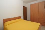 camera principale letto e armadio